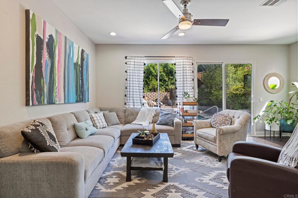 3880 Stoneridge Road Carlsbad, CA 92010 - Photo 15 of 29 a living room with furniture and a large window