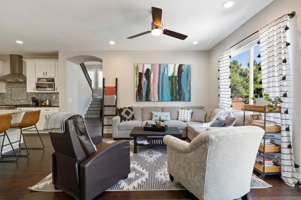 3880 Stoneridge Road Carlsbad, CA 92010 - Photo 16 of 29 a living room with furniture and a large window