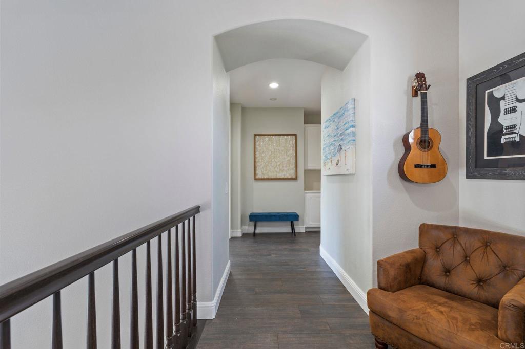 3880 Stoneridge Road Carlsbad, CA 92010 - Photo 23 of 29 a living room with furniture and a table
