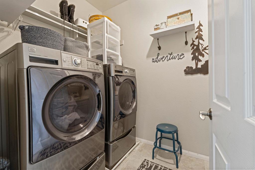 3880 Stoneridge Road Carlsbad, CA 92010 - Photo 26 of 29 a utility room with dryer and washer
