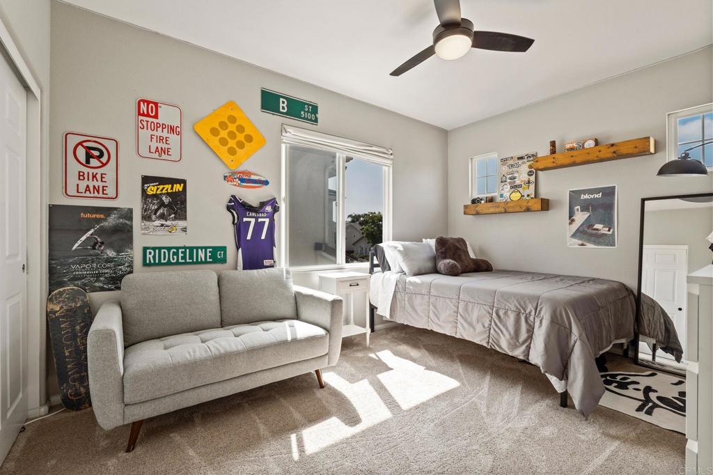 3880 Stoneridge Road Carlsbad, CA 92010 - Photo 29 of 29 a bedroom with furniture and a couch