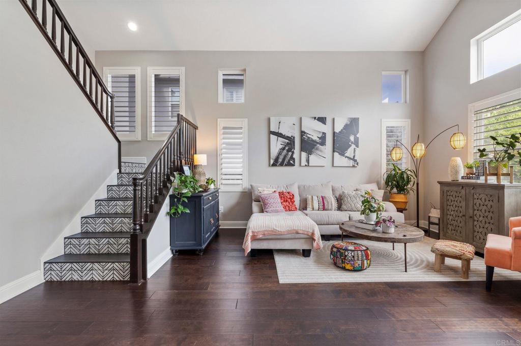 3880 Stoneridge Road Carlsbad, CA 92010 - Photo 3 of 29 a living room with furniture and wooden floor