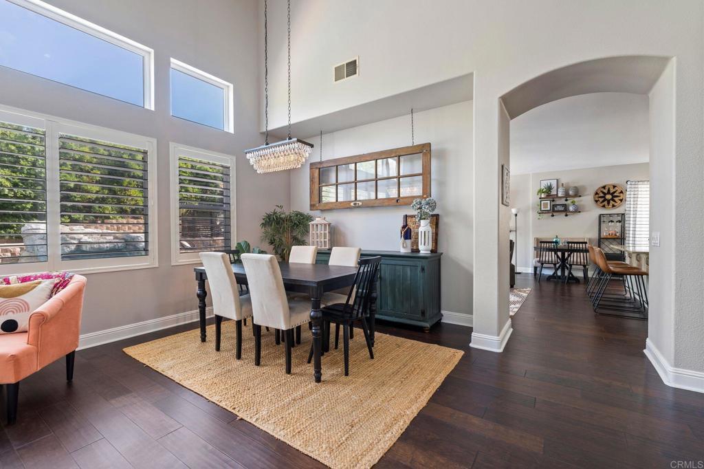 3880 Stoneridge Road Carlsbad, CA 92010 - Photo 6 of 29 a view of a dining room with furniture and wooden floor