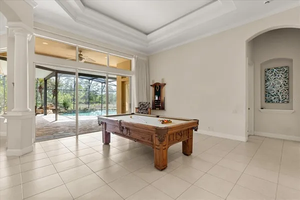 a room with furniture and air hockey table