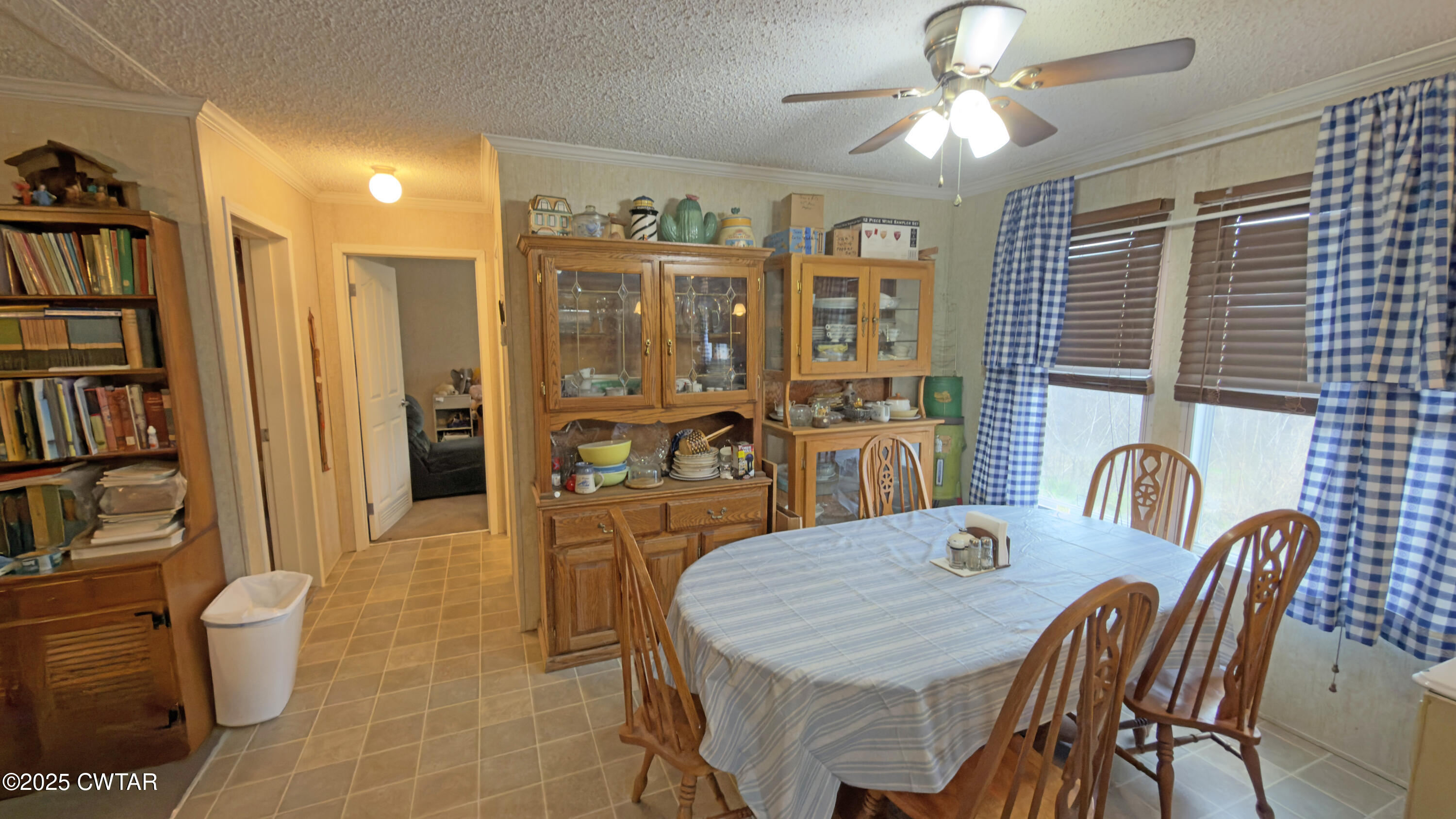 6599 Chestnut Bluff Road Friendship, TN 38034 - Photo 14 of 33 a dining room with furniture and window