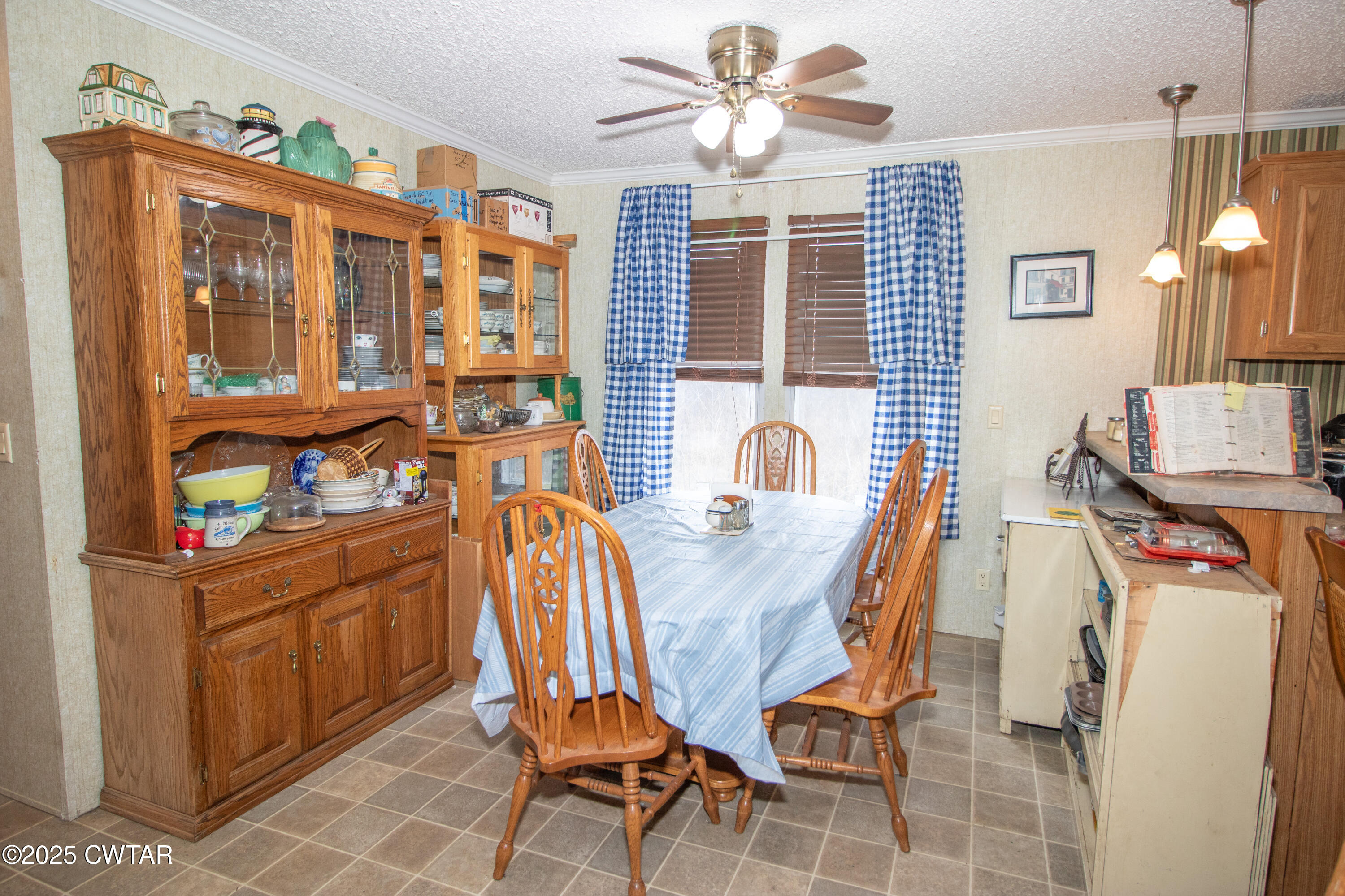 6599 Chestnut Bluff Road Friendship, TN 38034 - Photo 19 of 33 a view of a dining room with furniture and chandelier