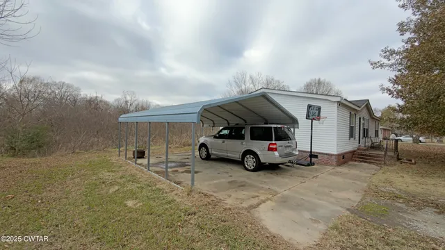 a car parked in front of a house