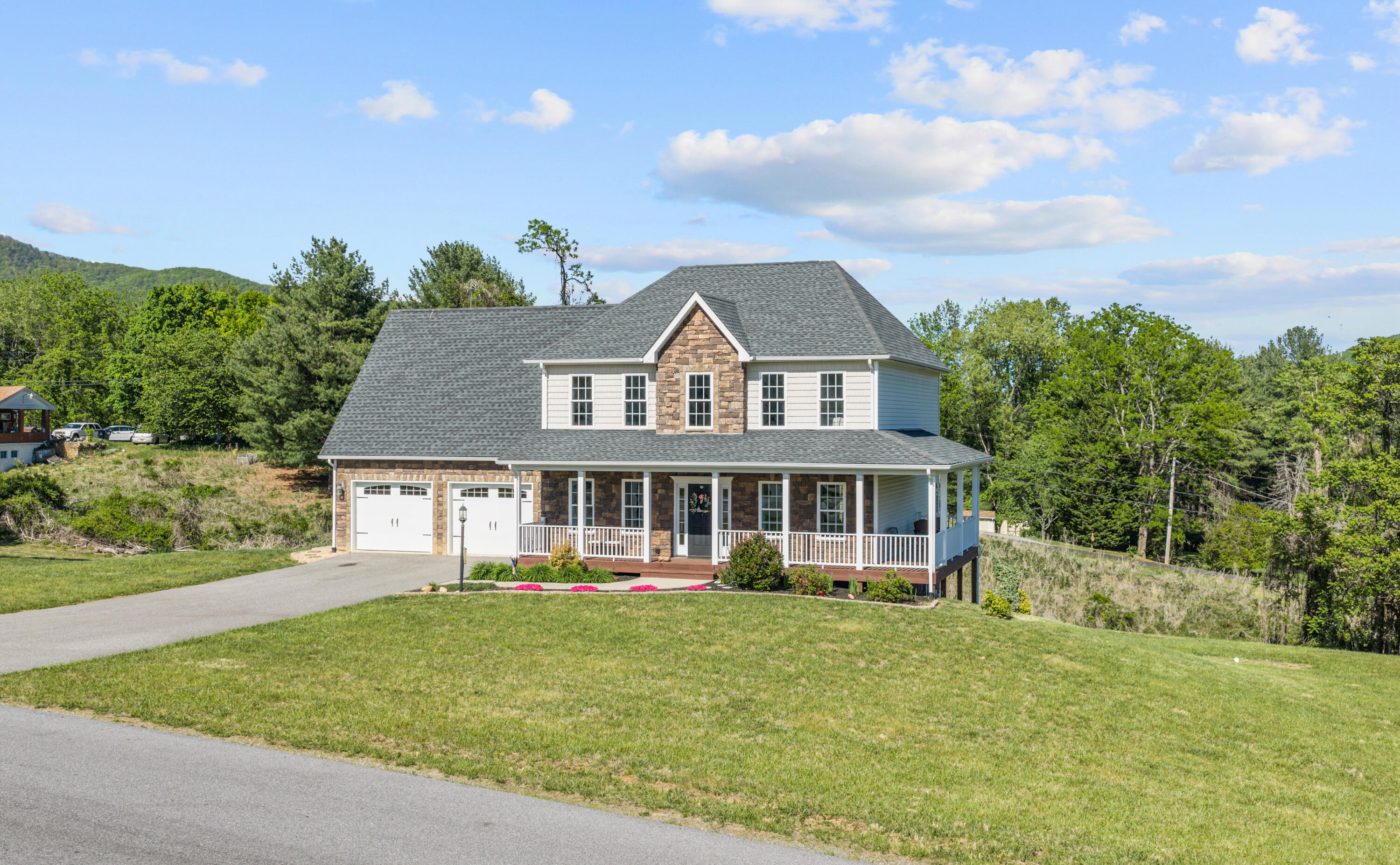 front view of a house with a yard