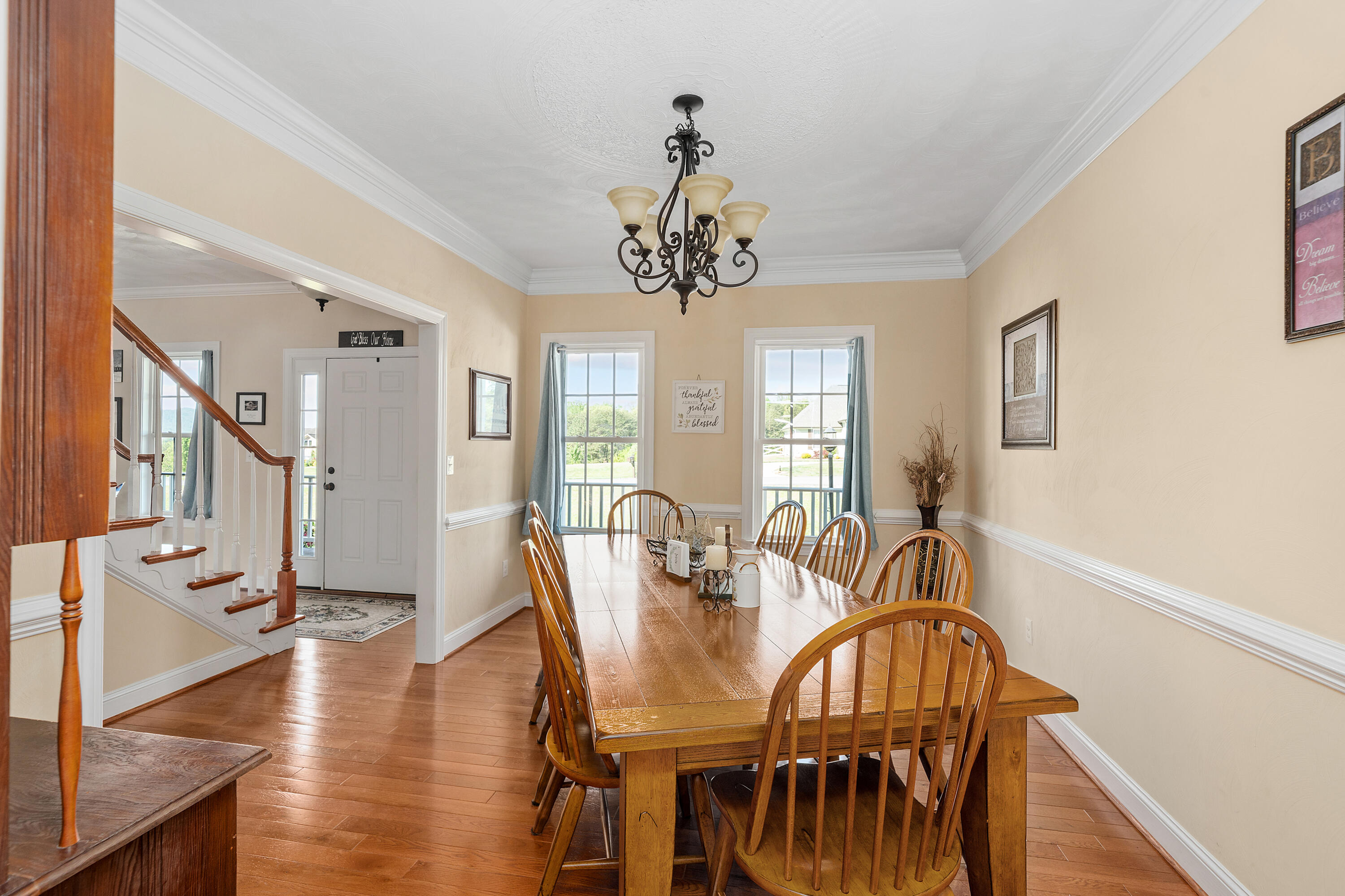 250 Thornblade Way Blue Ridge, VA 24064 - Photo 15 of 31 a view of a a dining room with furniture window and wooden floor
