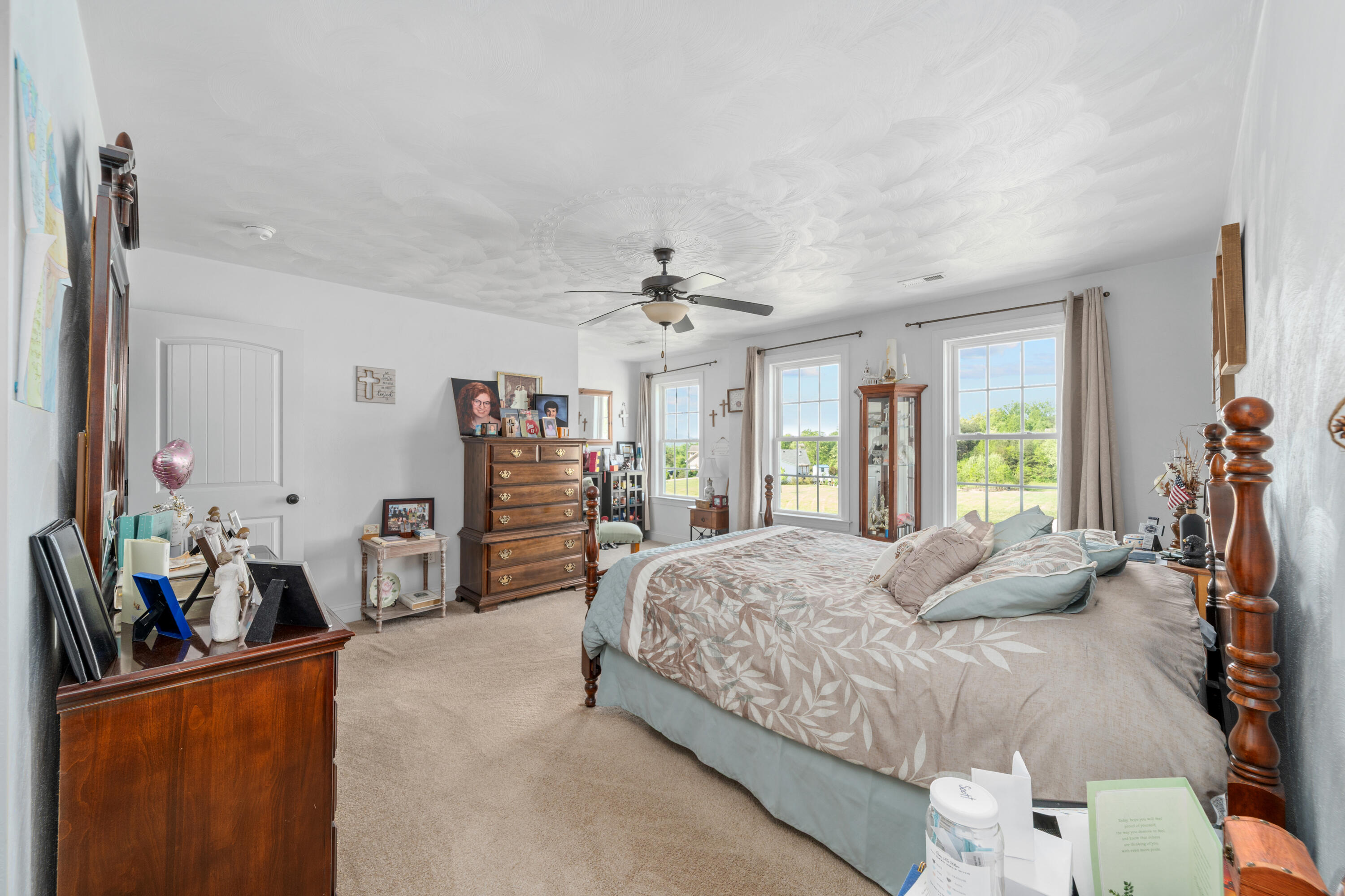 250 Thornblade Way Blue Ridge, VA 24064 - Photo 19 of 31 a bedroom with bed and large windows