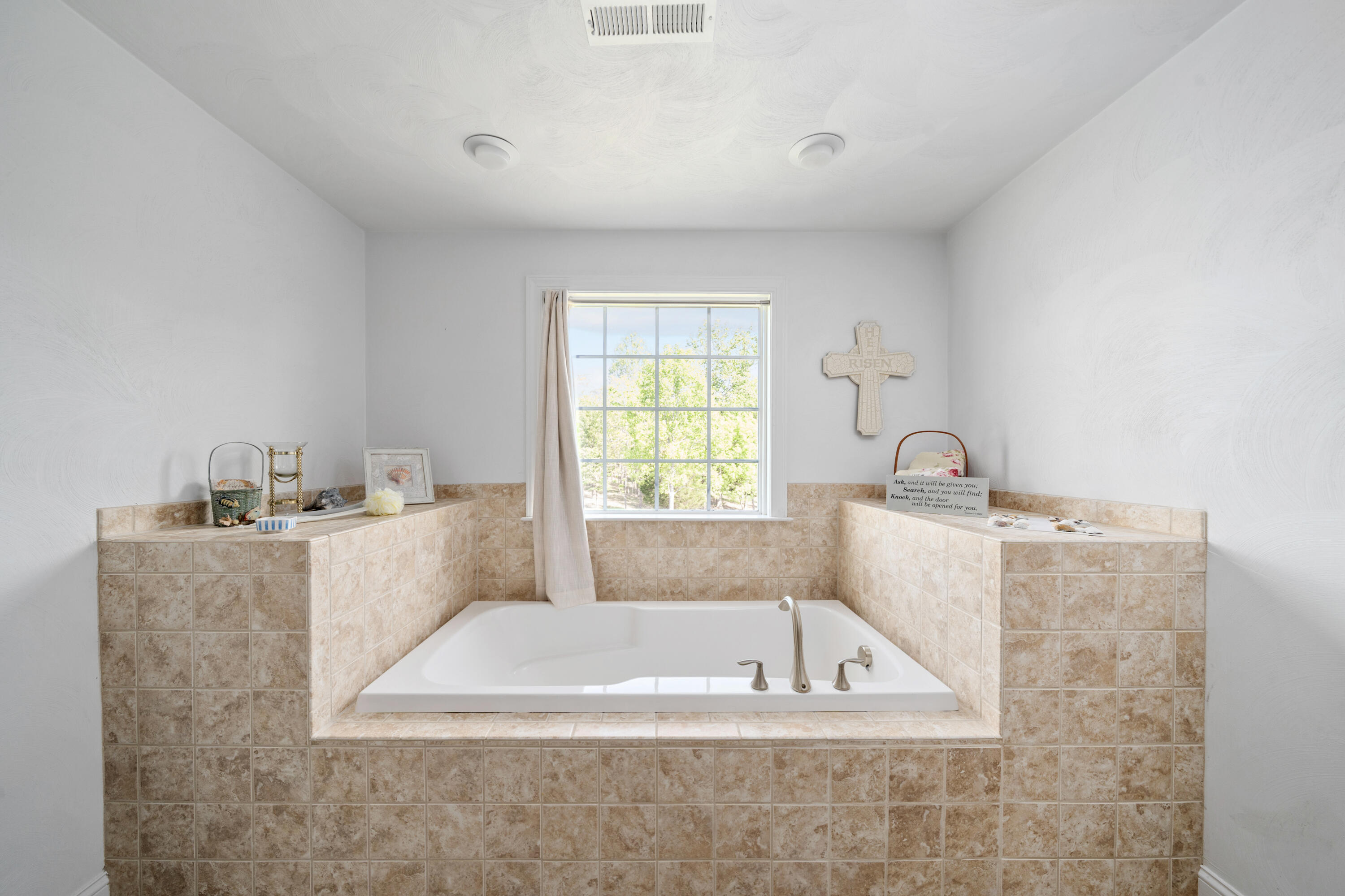 250 Thornblade Way Blue Ridge, VA 24064 - Photo 21 of 31 a bathroom with a bathtub and window