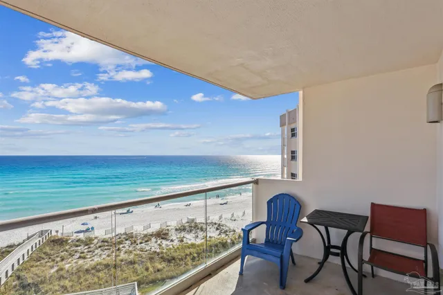a view of chairs and with wooden floor