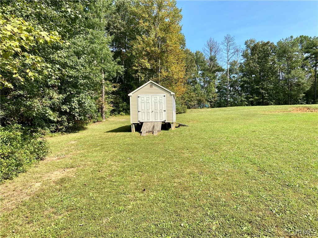9470 Robin Road Disputanta, VA 23842 - Photo 15 of 20 Detached Storage Shed