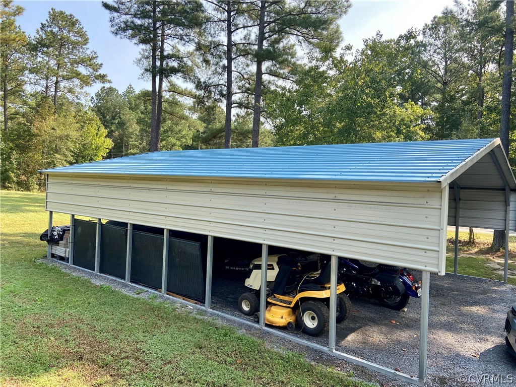 9470 Robin Road Disputanta, VA 23842 - Photo 19 of 20 Huge Carport provides storage space for all of you