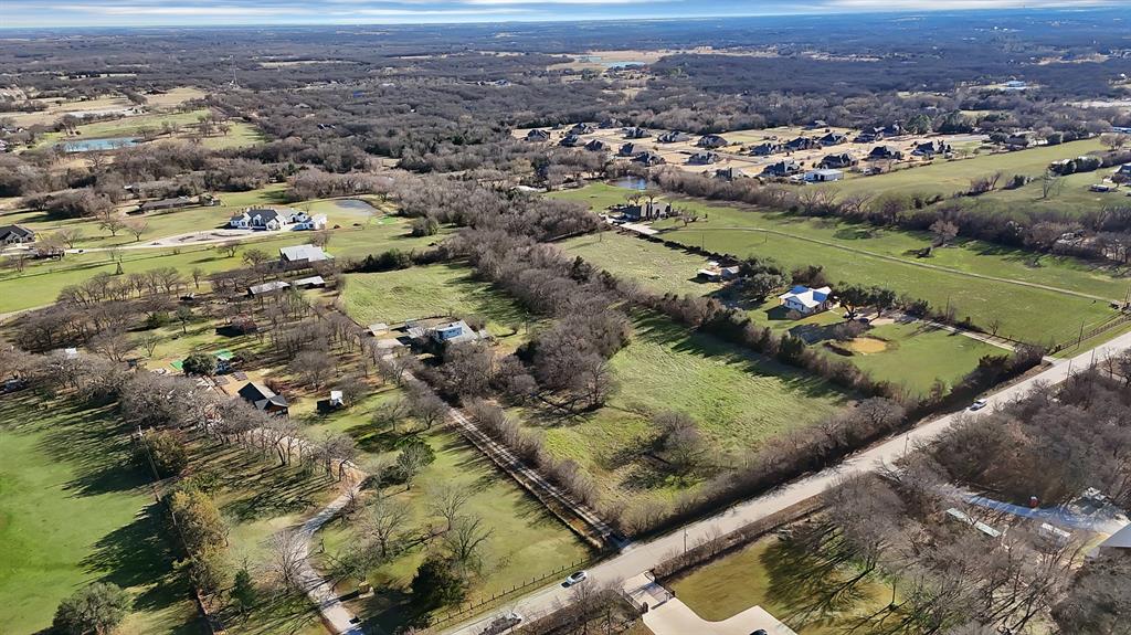 7320 Retta Mansfield Road Mansfield, TX 76063 - Photo 13 of 15 an aerial view of a house with a lake view