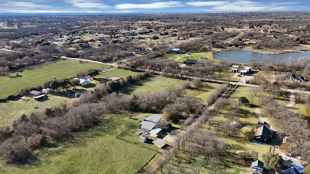 7320 Retta Mansfield Road Mansfield, TX 76063 - Photo 2 of 15 an aerial view of a houses with a yard