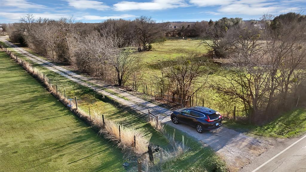 7320 Retta Mansfield Road Mansfield, TX 76063 - Photo 4 of 15 a view of a lake with a yard