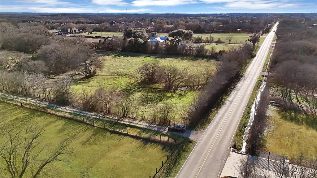 7320 Retta Mansfield Road Mansfield, TX 76063 - Photo 5 of 15 a view of a lake from a balcony