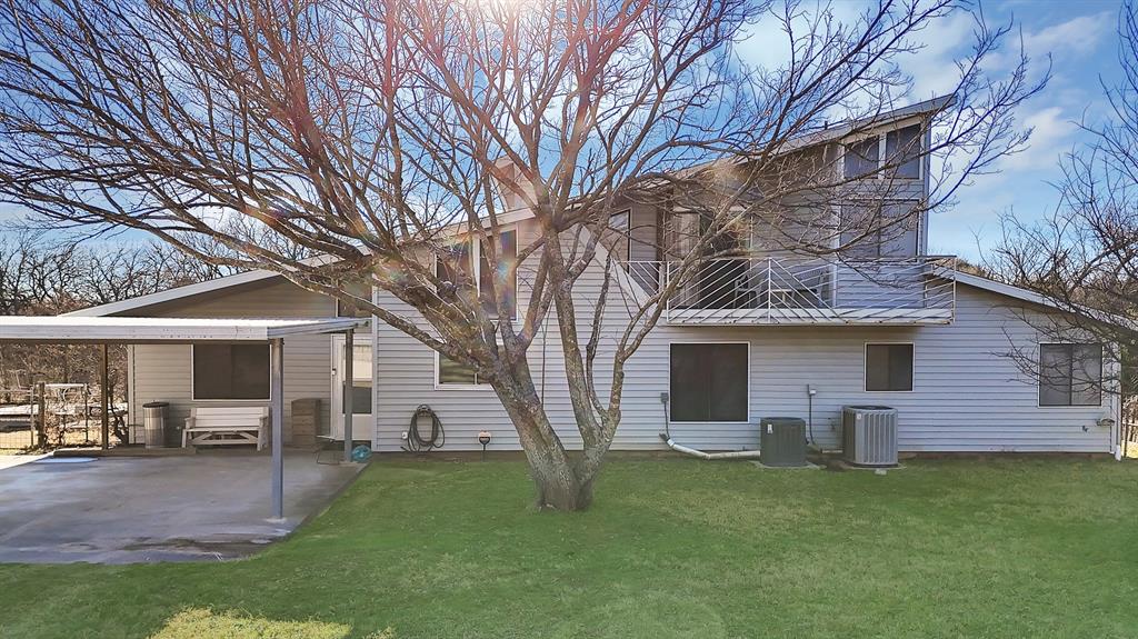 7320 Retta Mansfield Road Mansfield, TX 76063 - Photo 6 of 15 a view of a house with a yard