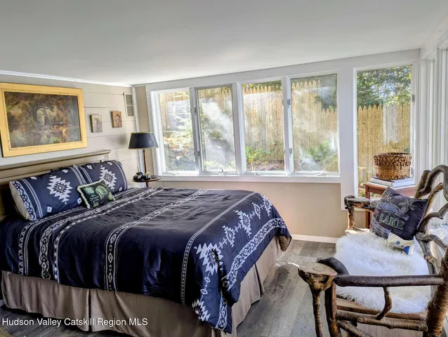 a view of a bench in wooden floor