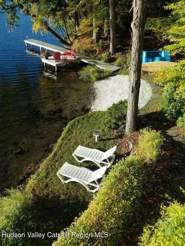 a view of a lake with a yard