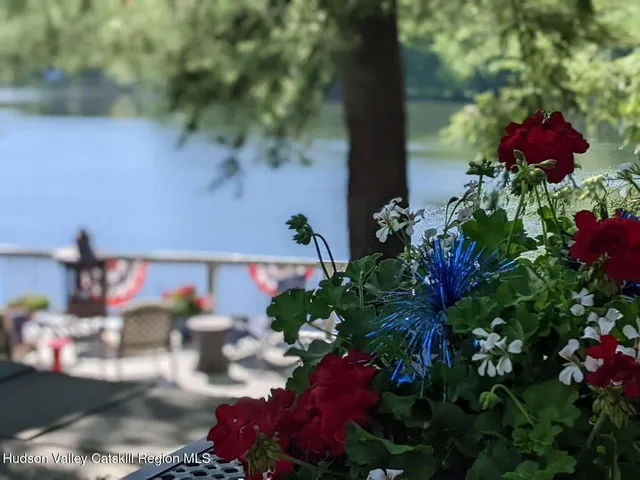 a house with river in front of it