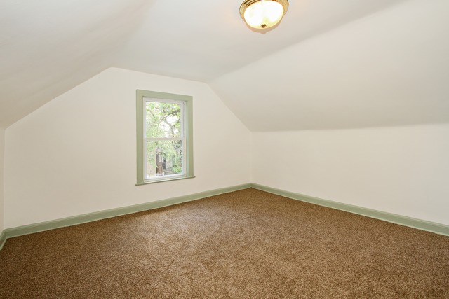 1512 South Springfield Avenue Chicago, IL 60623 - Photo 4 of 13 an empty room with a window