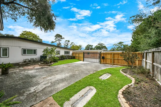 a view of a backyard with a garden