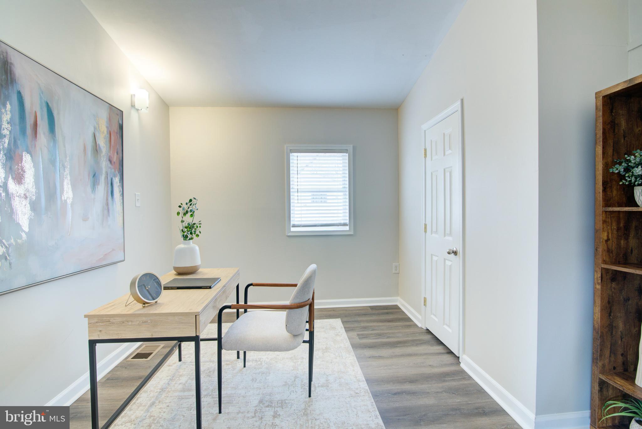 4103 Ivanhoe Lane Alexandria, VA 22310 - Photo 11 of 29 a view of a dining room with furniture and wooden floor