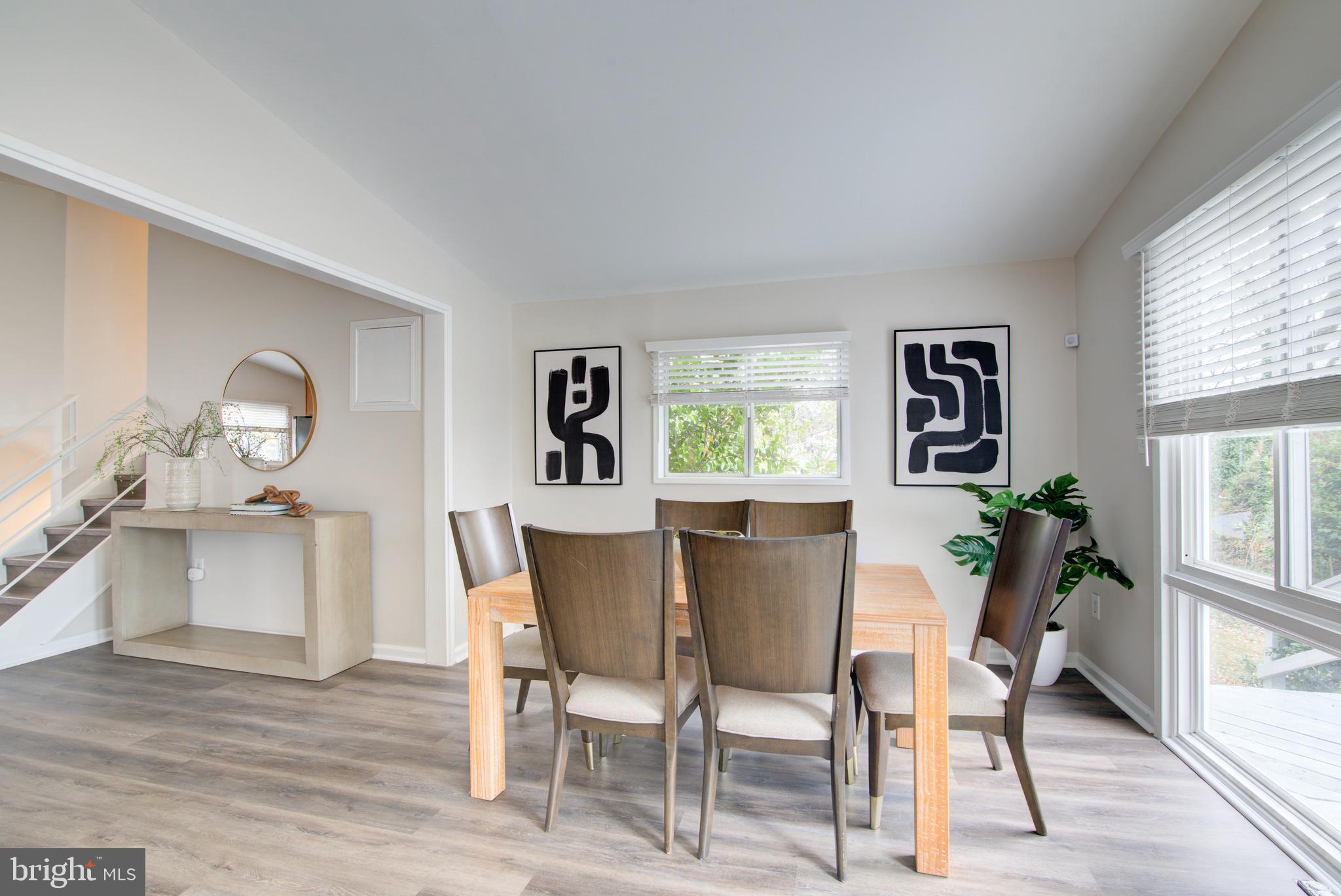 4103 Ivanhoe Lane Alexandria, VA 22310 - Photo 5 of 29 a view of a dining room with furniture and windows