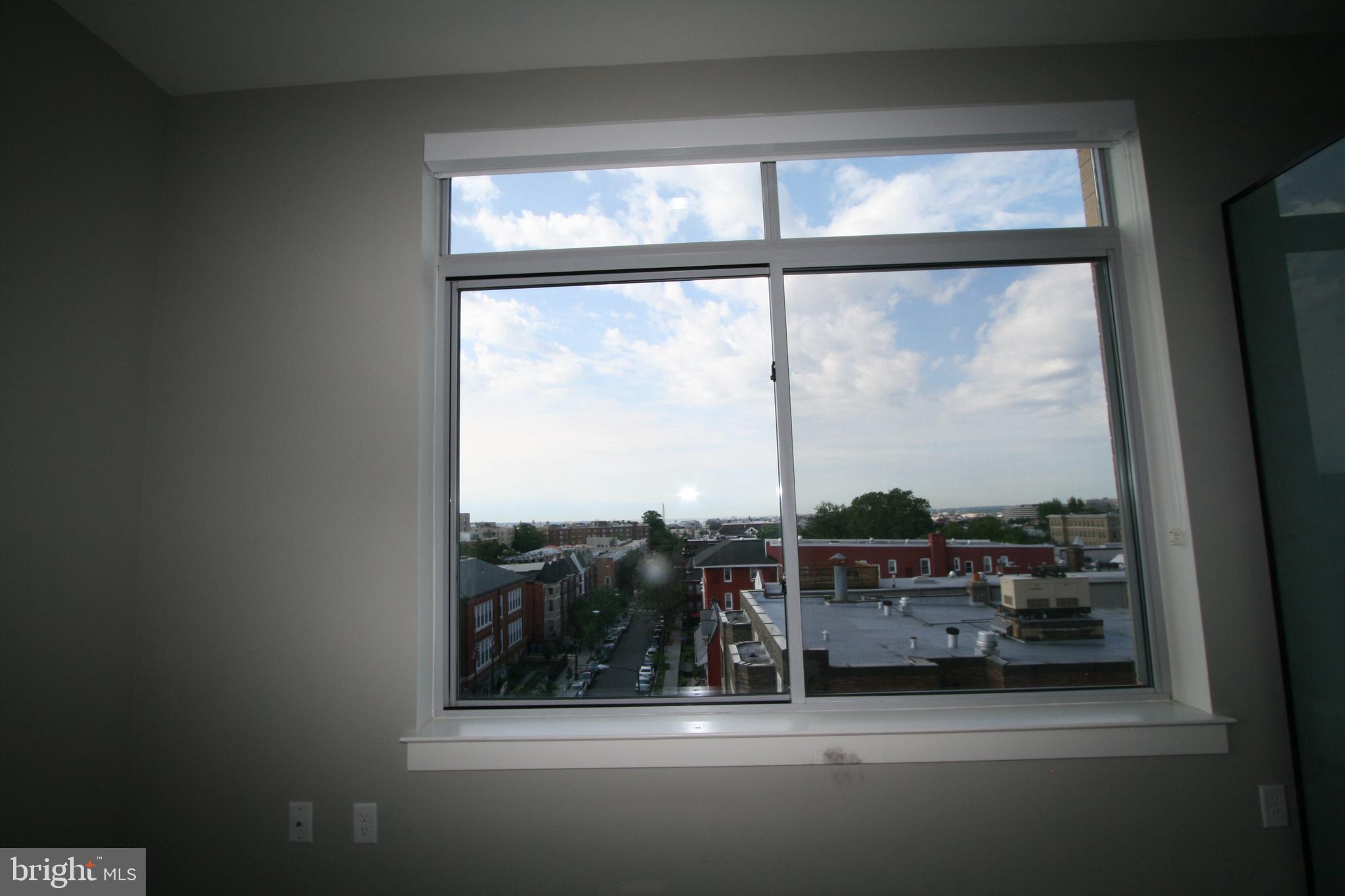 2550 17th Street Northwest, Unit 612 Washington, DC 20009 - Photo 21 of 55 a view of a glass door and a window