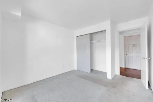 a bathroom with a sink toilet and a mirror