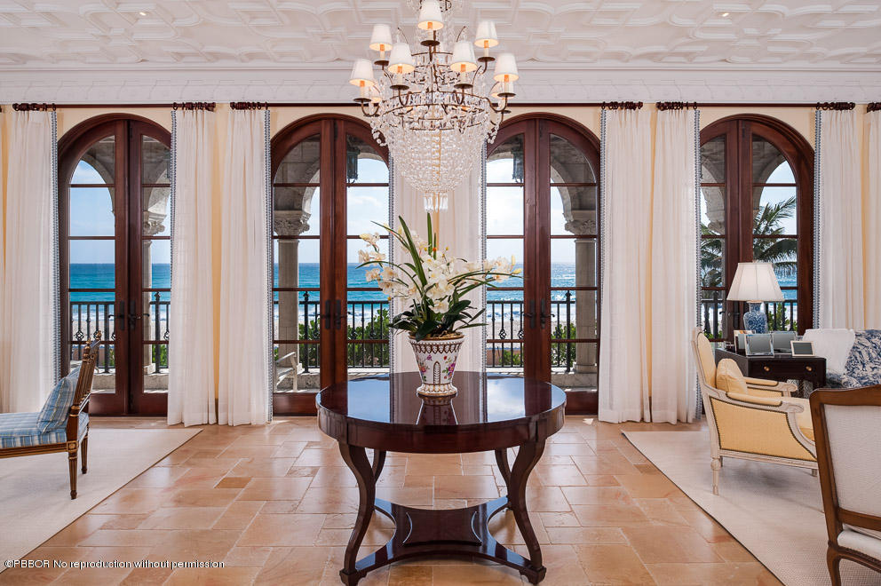102 Gulfstream Road, Unit A Palm Beach, FL 33480 - Photo 1 of 17 a view of a dining room with furniture and chandelier