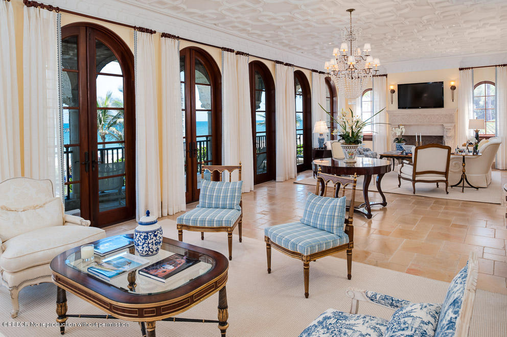 102 Gulfstream Road, Unit A Palm Beach, FL 33480 - Photo 2 of 17 a living room with furniture and a chandelier