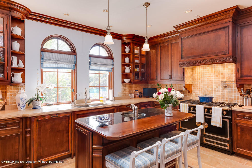 102 Gulfstream Road, Unit A Palm Beach, FL 33480 - Photo 12 of 17 a dining table with chairs and window