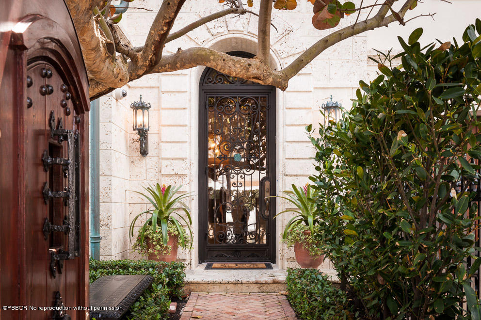 102 Gulfstream Road, Unit A Palm Beach, FL 33480 - Photo 16 of 17 a front view of a house with a tree