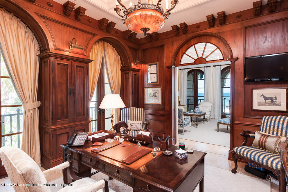 102 Gulfstream Road, Unit A Palm Beach, FL 33480 - Photo 6 of 17 a living room with furniture a fireplace and a flat screen tv