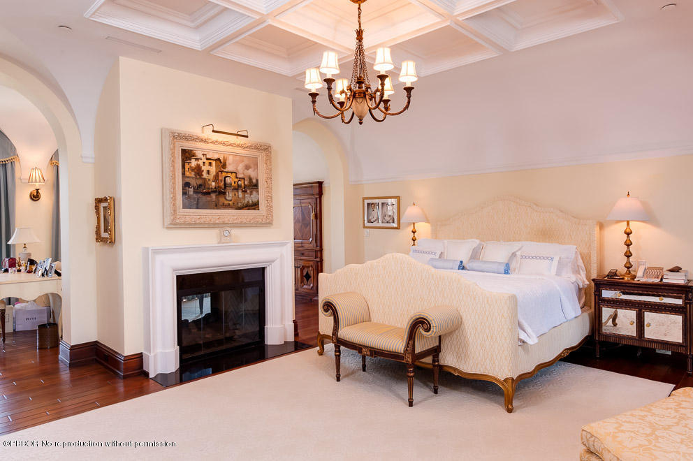 102 Gulfstream Road, Unit A Palm Beach, FL 33480 - Photo 7 of 17 a spacious bedroom with a bed and a fireplace