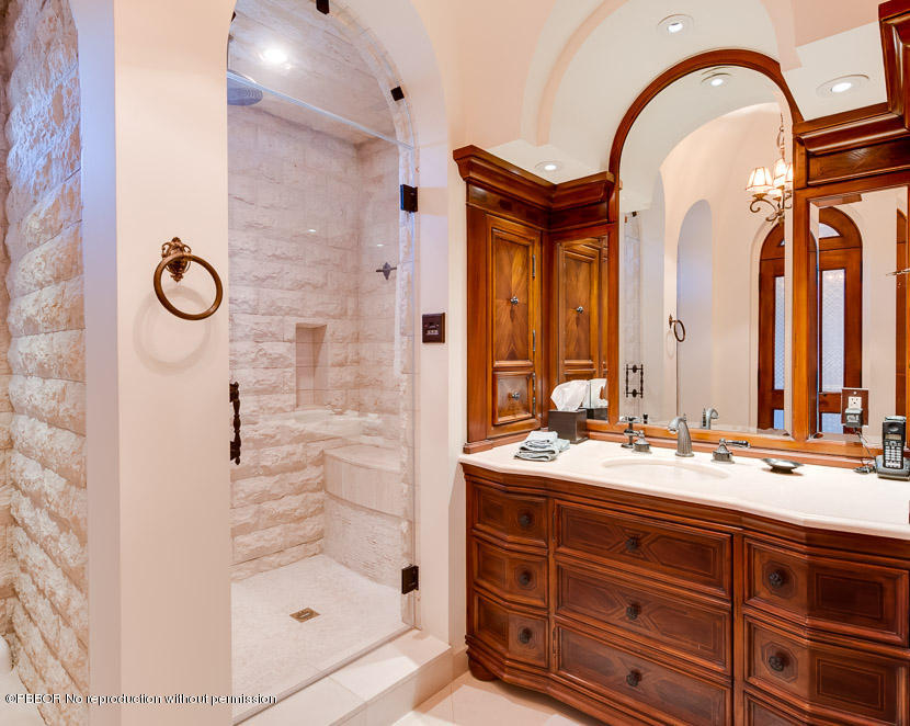 102 Gulfstream Road, Unit A Palm Beach, FL 33480 - Photo 9 of 17 a bathroom with a double vanity sink mirror and shower