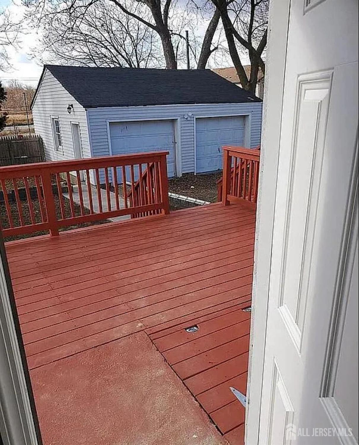 14-16 Kearney Street, Unit 14 Keyport, NJ 07735 - Photo 1 of 8 a balcony with wooden floor and furniture