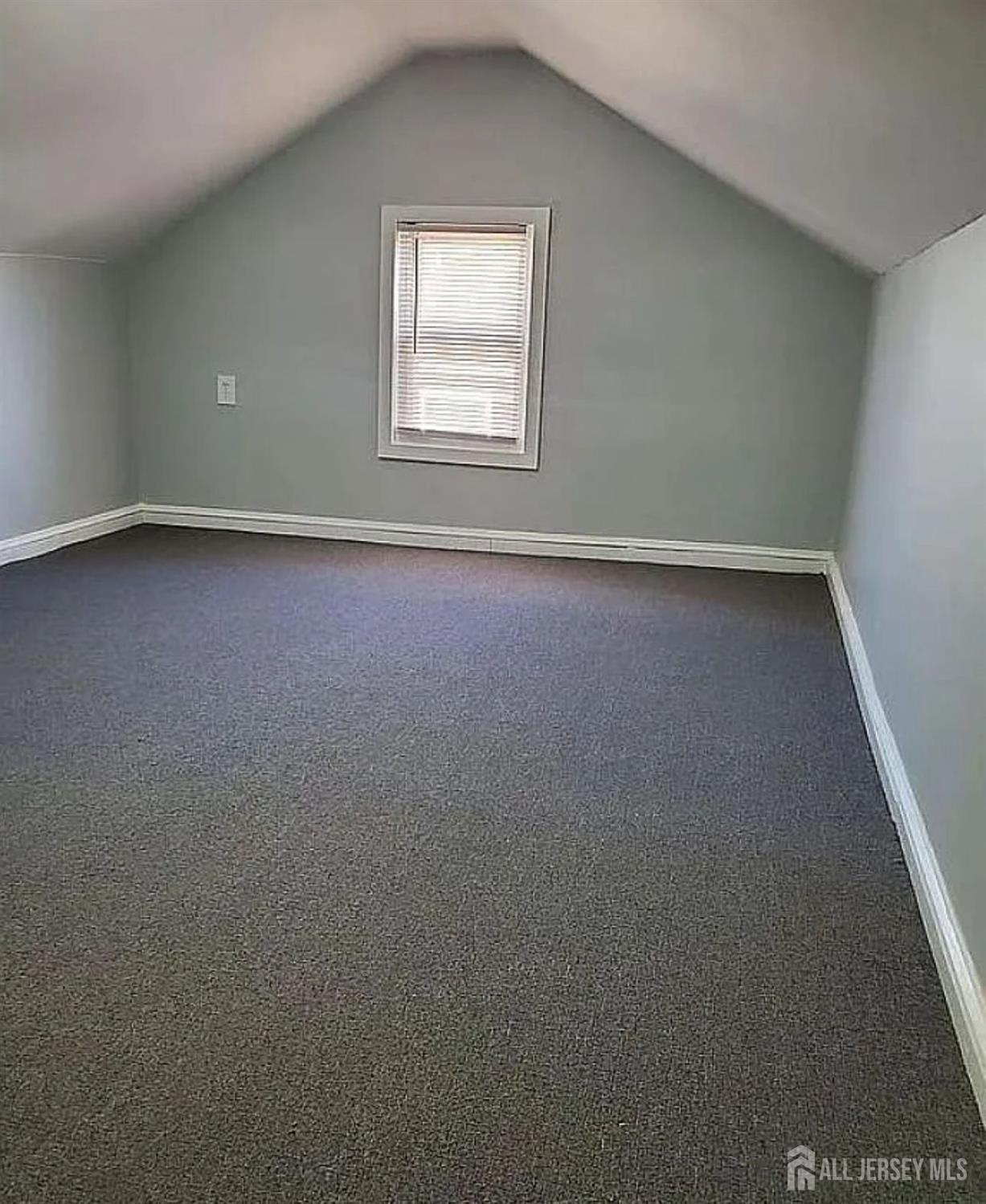 14-16 Kearney Street, Unit 14 Keyport, NJ 07735 - Photo 6 of 8 an empty room with a window