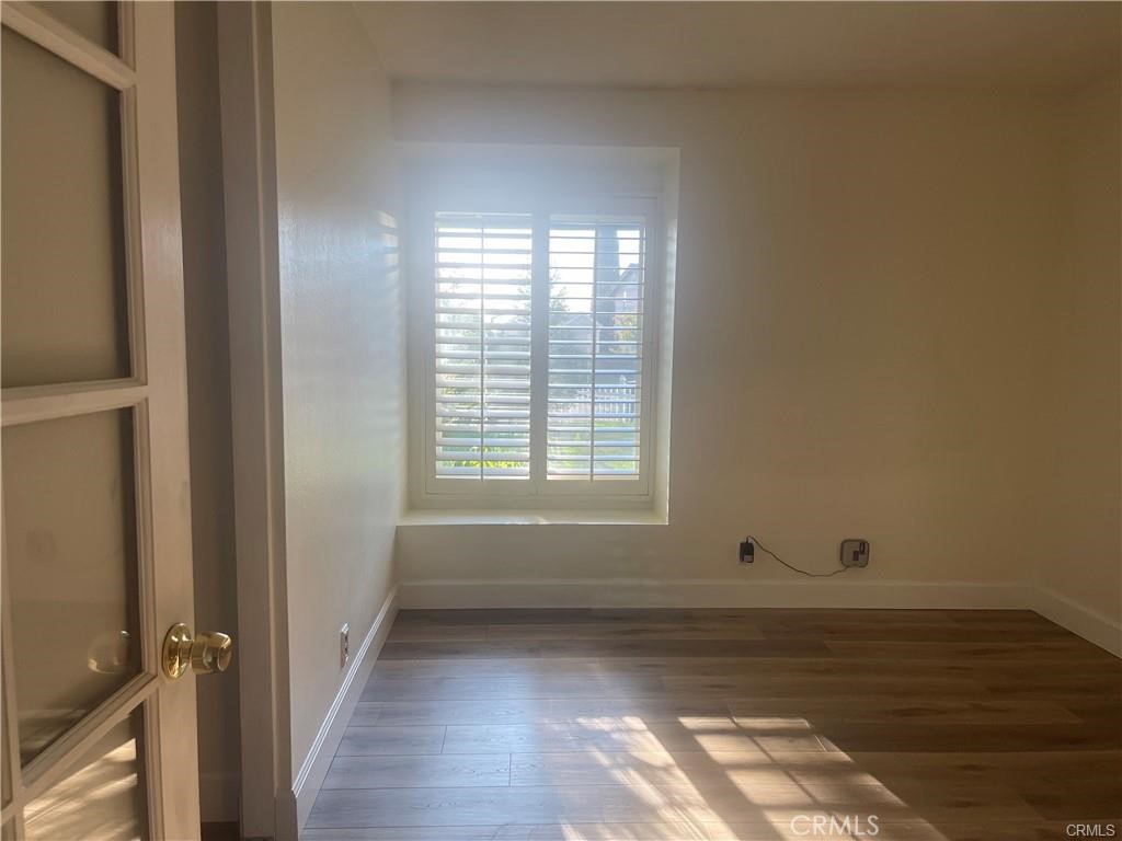 1246 Kinglake Drive Walnut, CA 91789 - Photo 6 of 9 a view of wooden floor and windows in a room