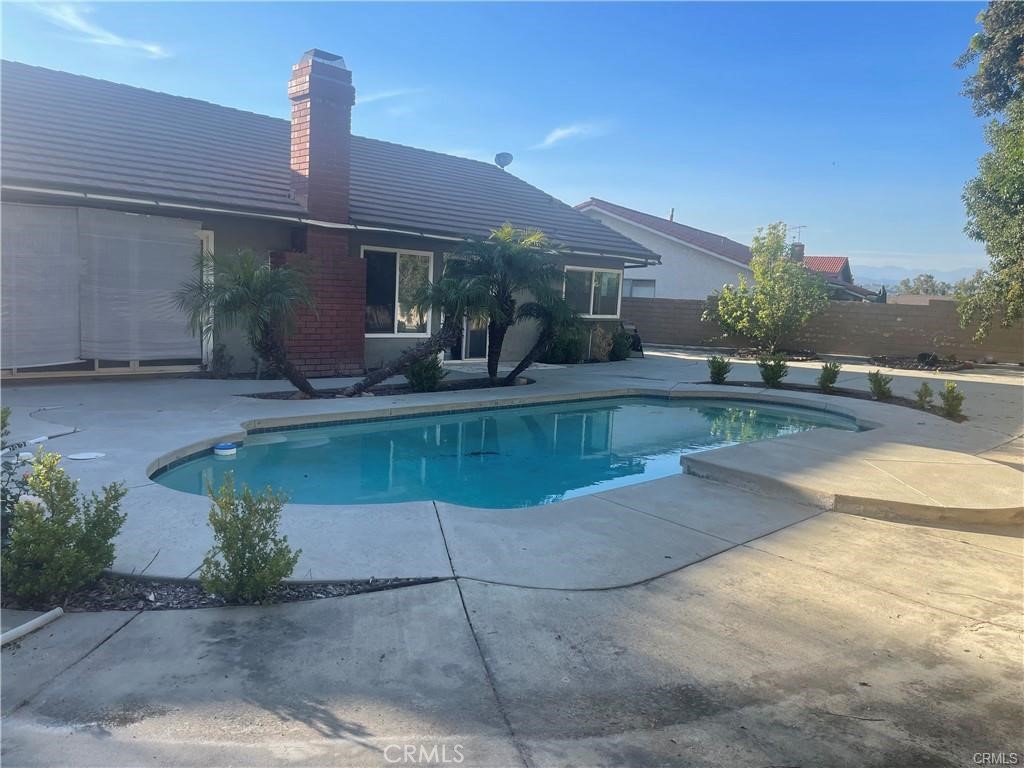 1246 Kinglake Drive Walnut, CA 91789 - Photo 9 of 9 a front view of a house with garden