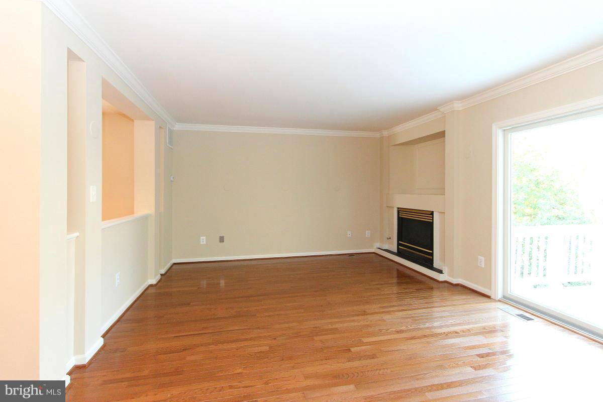 1708 Random Stone Court Reston, VA 20190 - Photo 3 of 30 Expansive Family Room With Gas Fireplace