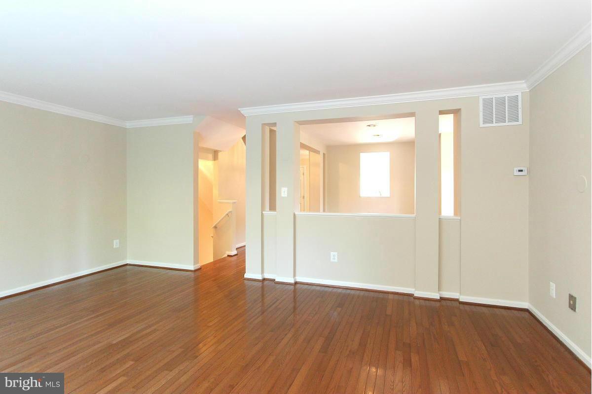 1708 Random Stone Court Reston, VA 20190 - Photo 7 of 30 Family Room Looking Into Separate Dining Room