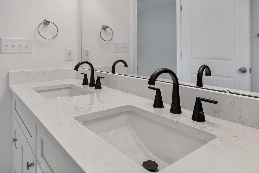 1303 East Main Street Waynesboro, VA 22980 - Photo 23 of 38 a bathroom with a sink and a tub