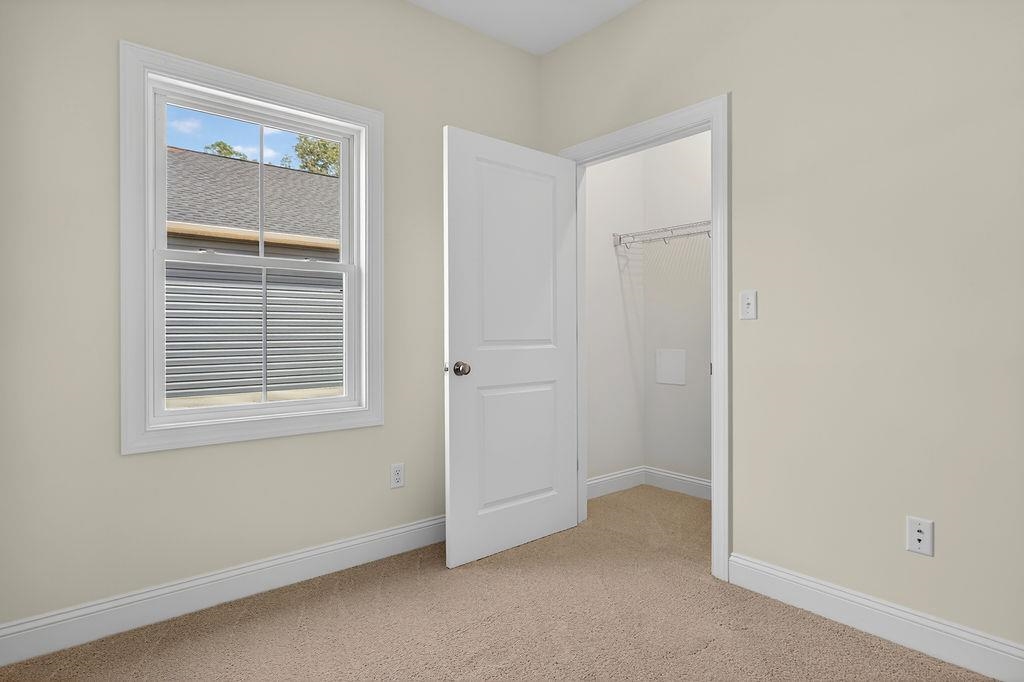 1303 East Main Street Waynesboro, VA 22980 - Photo 24 of 38 a view of an empty room with a window