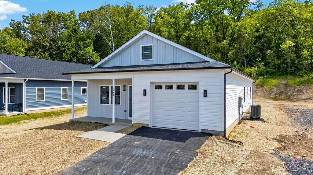 1303 East Main Street Waynesboro, VA 22980 - Photo 27 of 38 a front view of a house with a yard