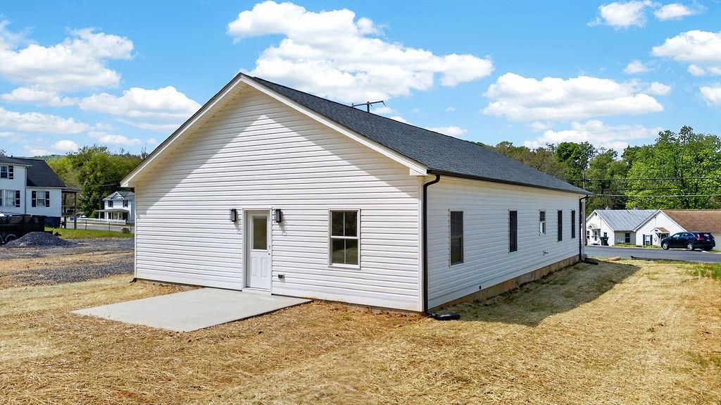 1303 East Main Street Waynesboro, VA 22980 - Photo 29 of 38 a view of a house with a backyard