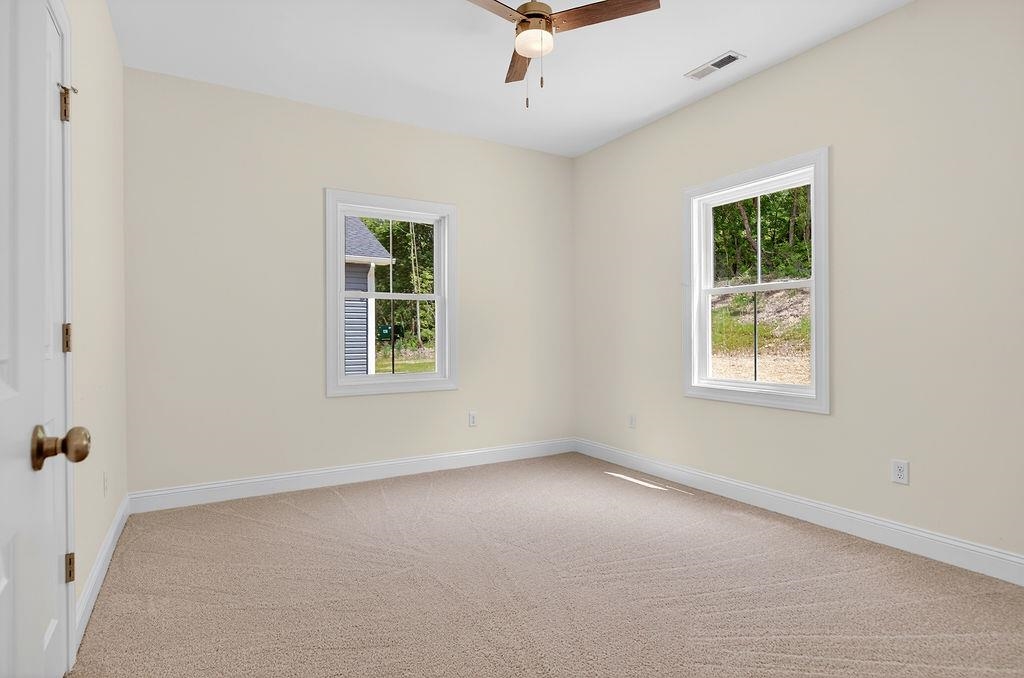 1303 East Main Street Waynesboro, VA 22980 - Photo 36 of 38 an empty room with a window